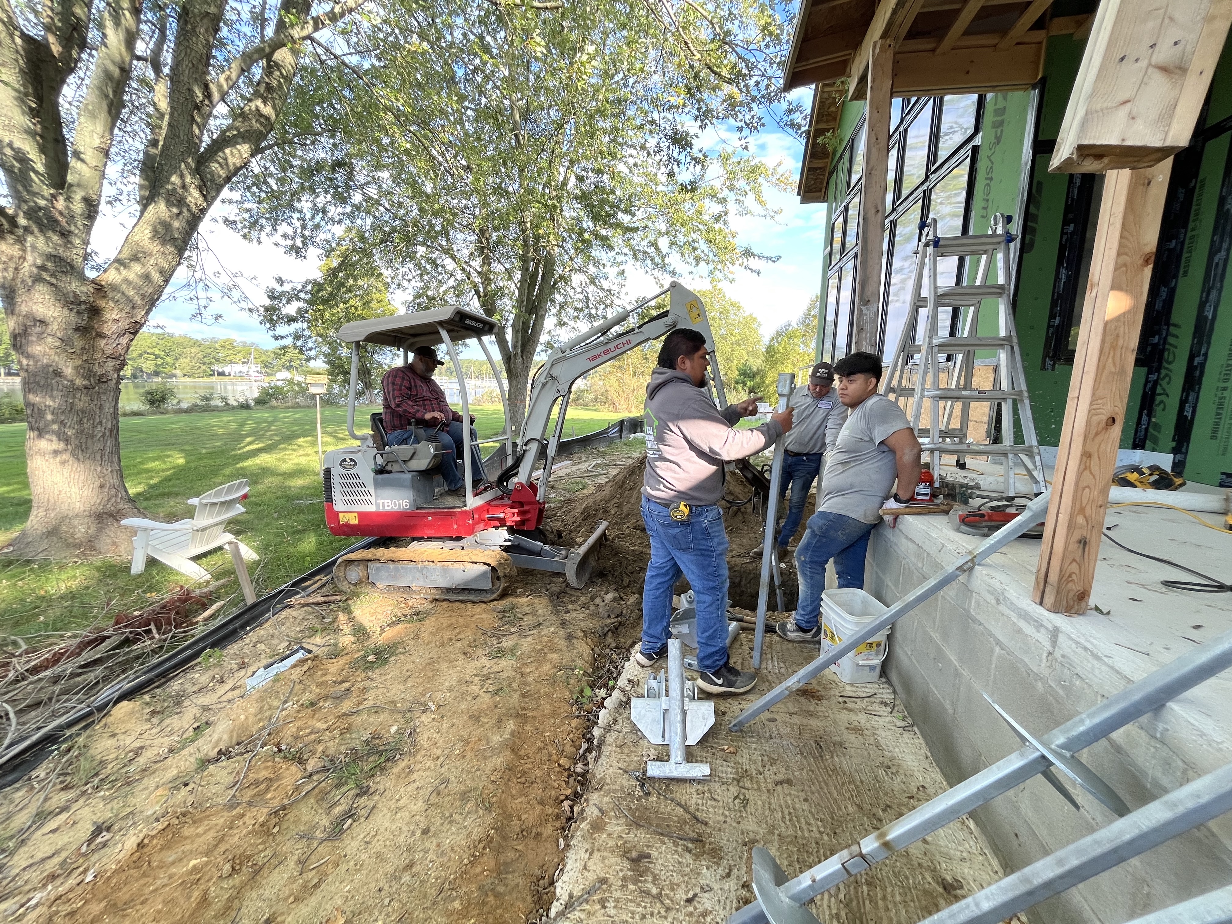 total home performance team putting up a wall