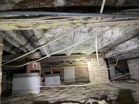 Dirt crawlspace in Eastern Shore, Maryland prior to encapsulation performed by THP team